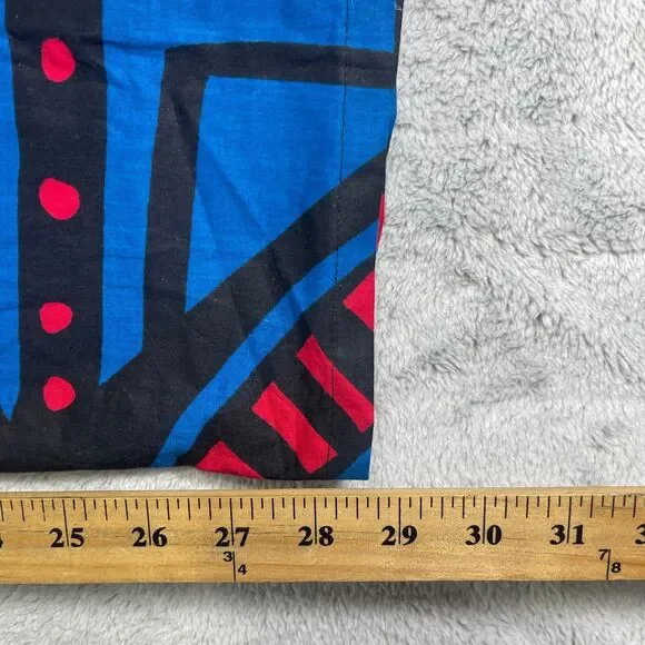 Vibrant Geometric Jumpsuit in Blue and Red - Picture 14 of 16